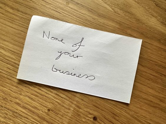 None of Your Business sticky note